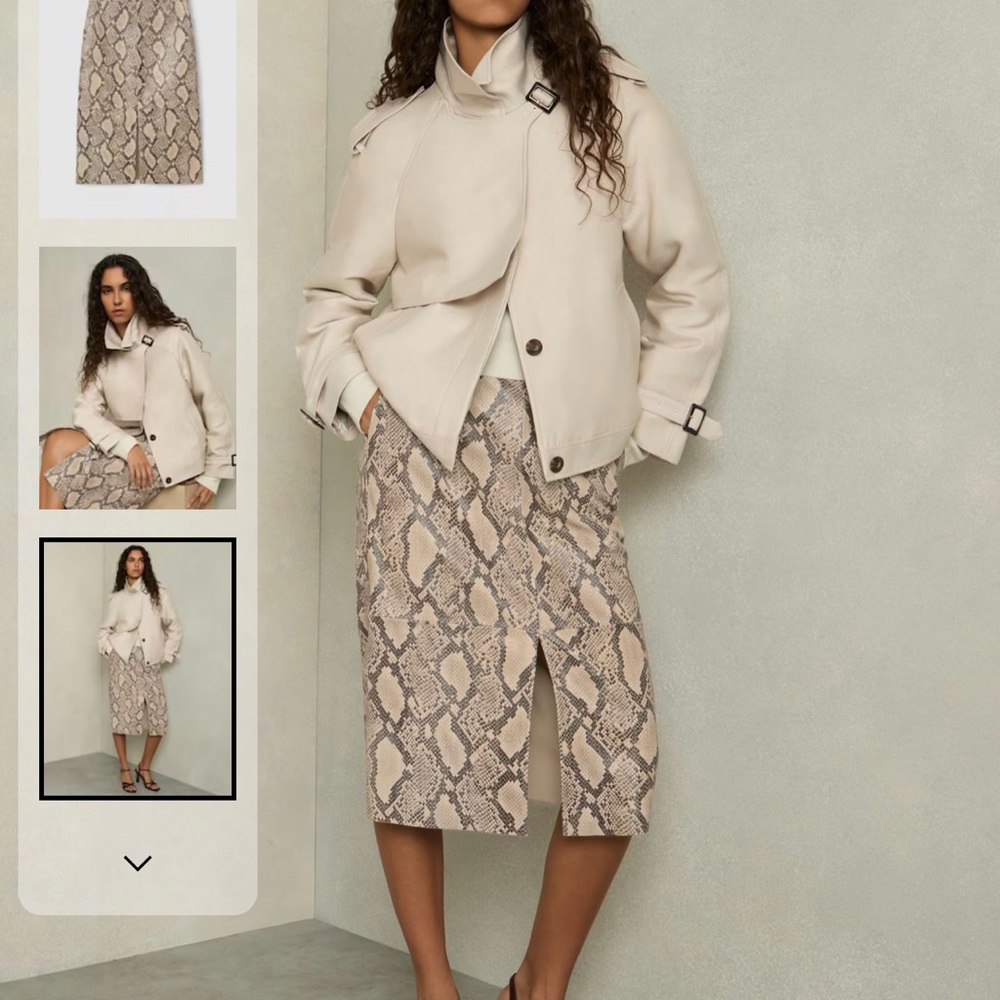 Stylish Leather Snake Print Skirt (new with tags), sizes 14 and 16 are available